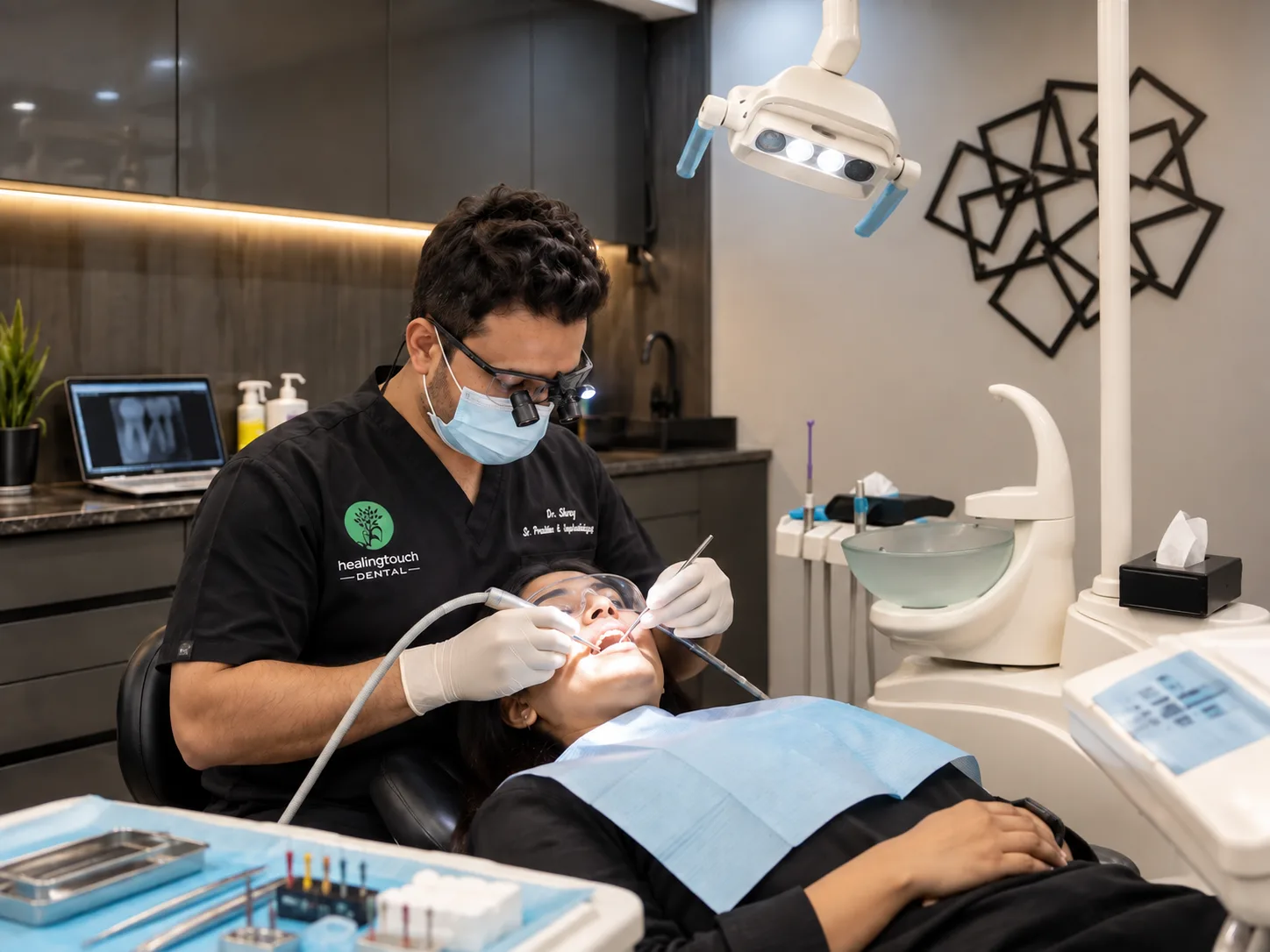 Dr. Shrey Nandi performing painless root canal treatment at Healing Touch Dental Gurgaon